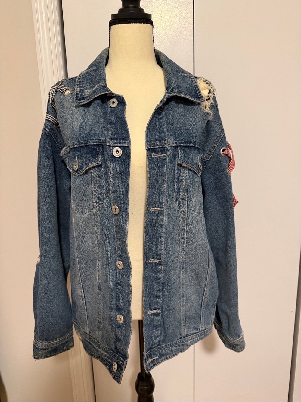 Womens Blue Distressed Denim Jacket with Ribbon Detailing